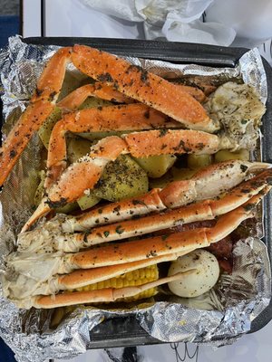 Crab legs, potatoes, sausage and corn