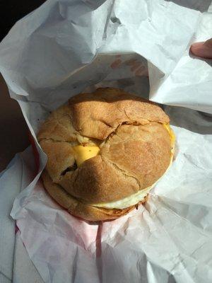 Croissant sausage, egg, and cheese sandwich