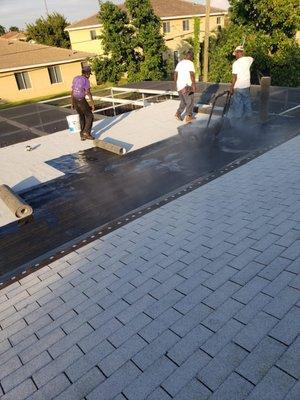 Our workers completing  a roof.