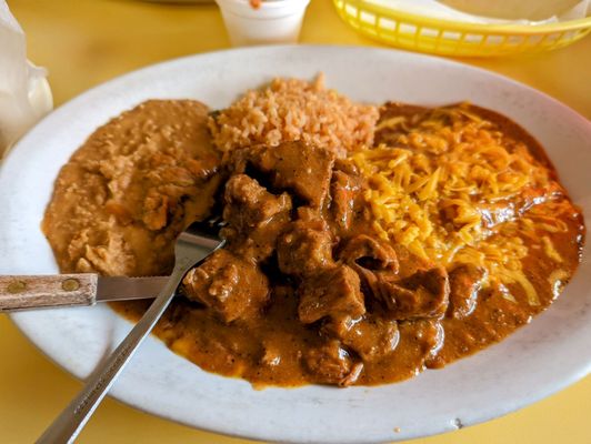 Lunch special #10 Texas Plate with beef tips, enchiladas, rice and beans...so good $7.99  Mar2023