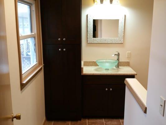 new bathroom vanity and pantry with vessel bowl