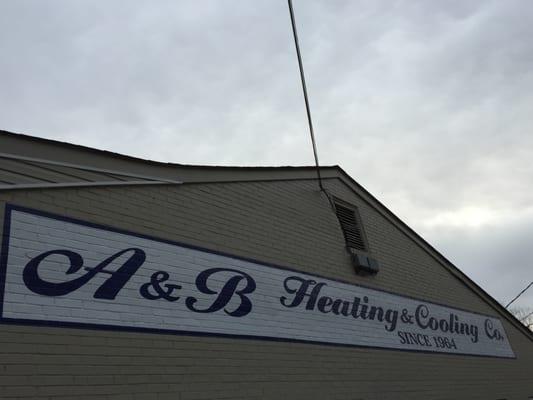 We are proud of our heritage, this hand-painted sign on our building resembles the logo from the 1960's.