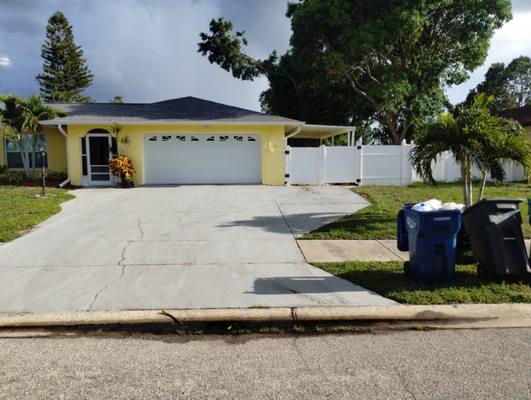 A new fence gate and fence on the side of house as well as the front screen door installed