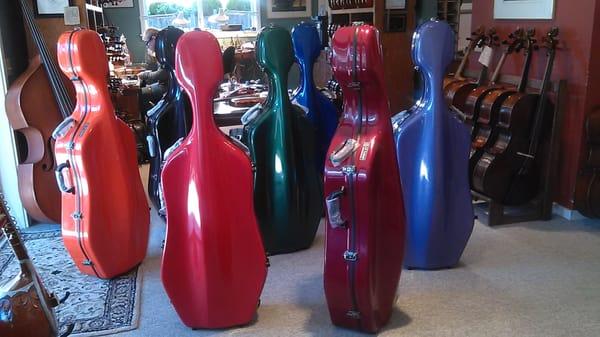 Rainbow of cello cases!