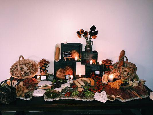 A tasty charcuterie table at a beautiful wedding.