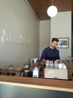 yes, this mens boutique serves espresso! Nathan creating a delicious latte.