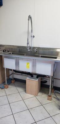 Commercial 3 compartment kitchen sink.