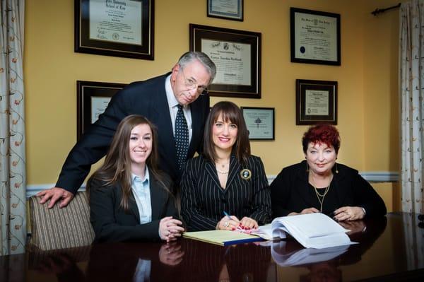 Standing:  Herman Osofsky, Esq., of Counsel
Seated:  Left to right:  Samantha E. Hirtler, Esq.; Tanya N...