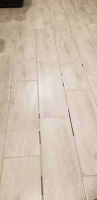 Grout started breaking apart after 2 months of moving in.