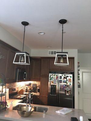 Pendant lights over the kitchen island