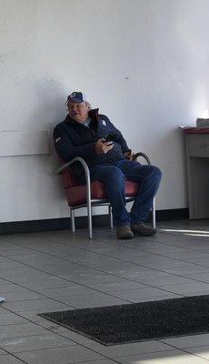 Don sitting in Discount Tire unmasked looking over and speaking with employ.  Maybe the other locations take COVID more seriously!