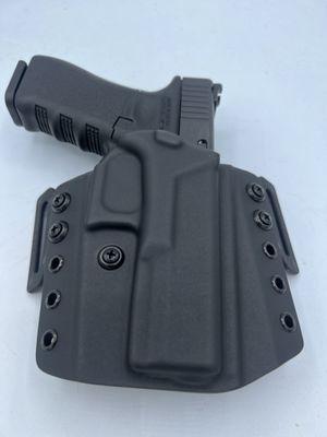 We manufacture and design custom kydex holsters to your specifications