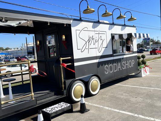 Unlike any soda shop you've ever seen! Porch for walk up orders or drive thru window.