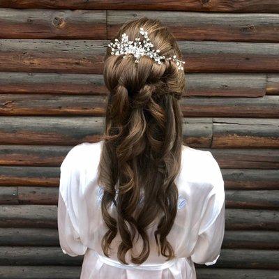 Half up Bridal design with embellished comb baby's breath