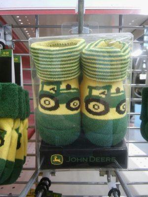 How can you NOT love a store with cute little socks like this?! I can almost smell the fields.... -E