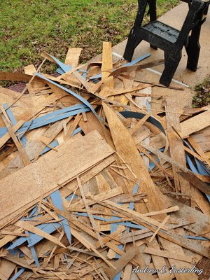 What was left of the damaged plywood. It literally turned into toothpicks. I broke it down and put in contractor-grade trash bags.