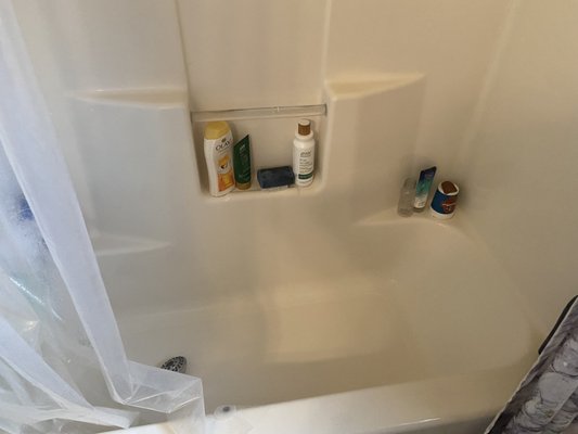 Shower after a deep clean removing all hard water stains