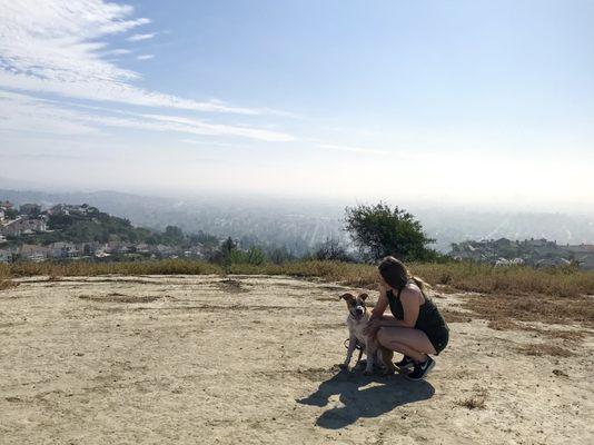 Saidee working with Luca on a hike.