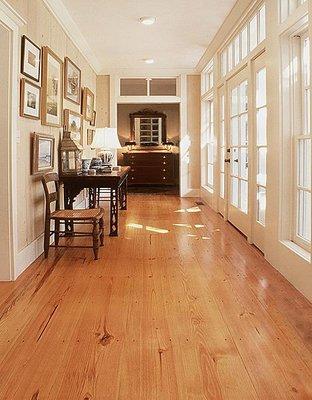 Southern Wood Floors Reclaimed Antique Heart Pine finished for a sunlit interior hall.