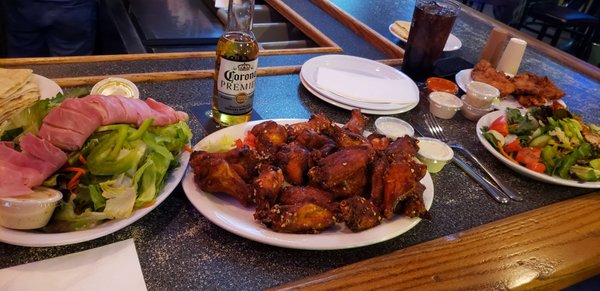 Garlic Parm Wings, Julienne Salad, Garden Salad, Chicken Tenders (breaded in house)