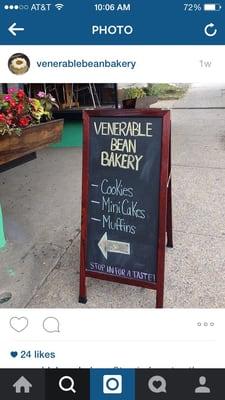 Sign outside of the storefront. Welcoming pedestrians to all of the amazing treats inside!