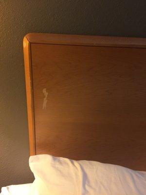 Gouged up headboard.