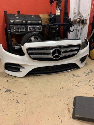 mercedes bumper ripped off from parking brick