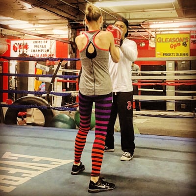 Freddy Rivera training a boxing client in NYC.