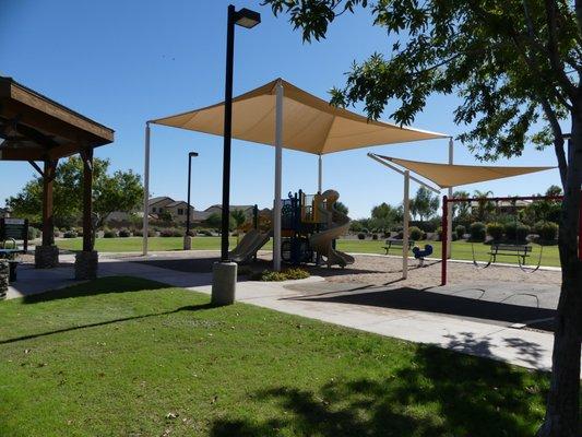 Shaded playground and swings Indigo Sky Recreation area in Johnson Ranch  San Tan Valley, AZ