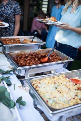 Top view of trays of food at a catering event