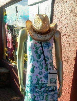 Yes Spring is just around the corner and we have gotten in lovely light weight dresses in southwest cactus and feather prints.