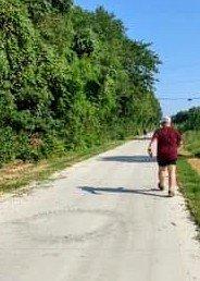 Me heading Northish on the New SoPac Trail, 1/4 mile from Fisher Rd Gateway up ahead.