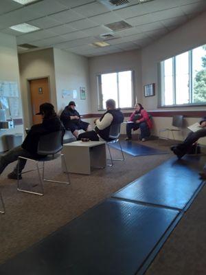 Dept of motor vehicle lobby.  No social distancing,  no mask  chairs not 6 ft.  This is not safe.