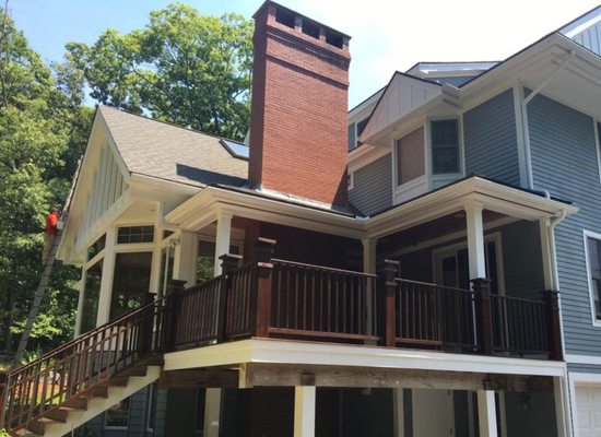 Lexington home. Full exterior painting including deck and railings stain.