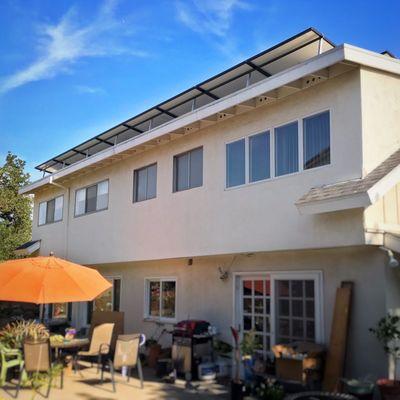 Two 10 panel rows of solar panels up top.