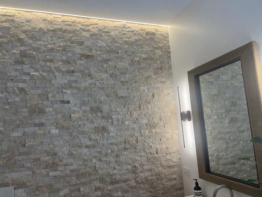 Recessed strip lighting.