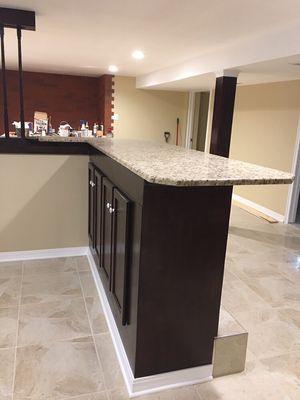 Normal wall cabinets adapted and barnished for granite