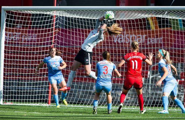 Red Stars goalie, Alyssa Naeher raising up for a save at Toyota Park.  Alyssa is also a member of the U.S. Women's National Team!