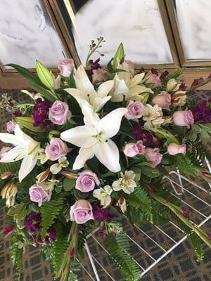 Casket Spray with lilies, roses, alstroemerias, gladiolus and stock.