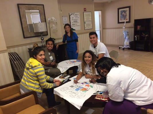 Staff making their Nursing home shirts!