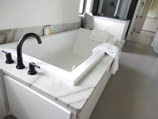 Latte dolomite tub surround