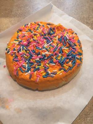 Regular cookie with frosting and sprinkles