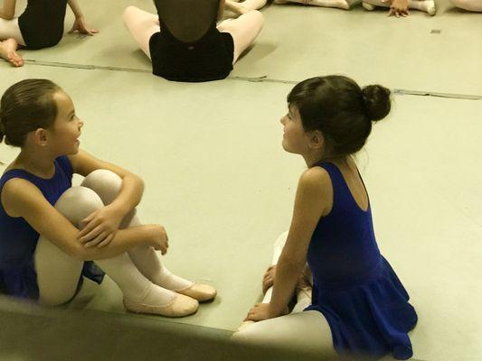 Two friends exchanging ideas on dance even at this young age!