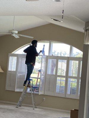 Karl removing old window, cutting and replacing on site.