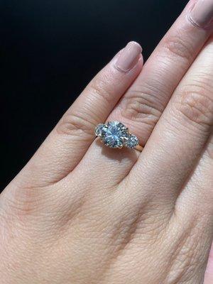 The engagement ring on my fiancées hand