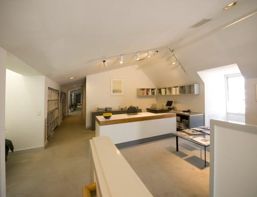 The 1935 attic converted into professional architectural office reception area.