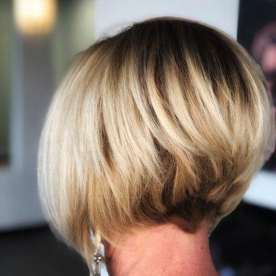 Haircuts with style and grace!  Blonde highlights by AmyM