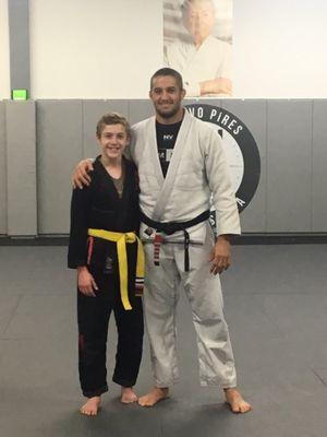 My son colby and professor Gustavo for a stripe promotion