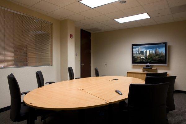 This is 1 of 4 of our meeting rooms. We have 6, 12, 12, and 25 person capacity rooms that we rent by the hour.