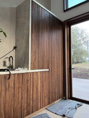 Wet bar. Walnut slats.